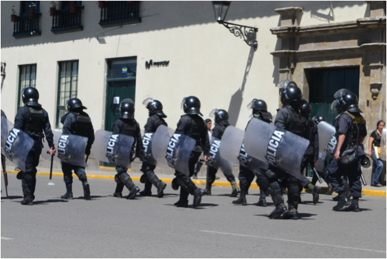 National police patrol the streets of Cajamarca on the fourth of July.