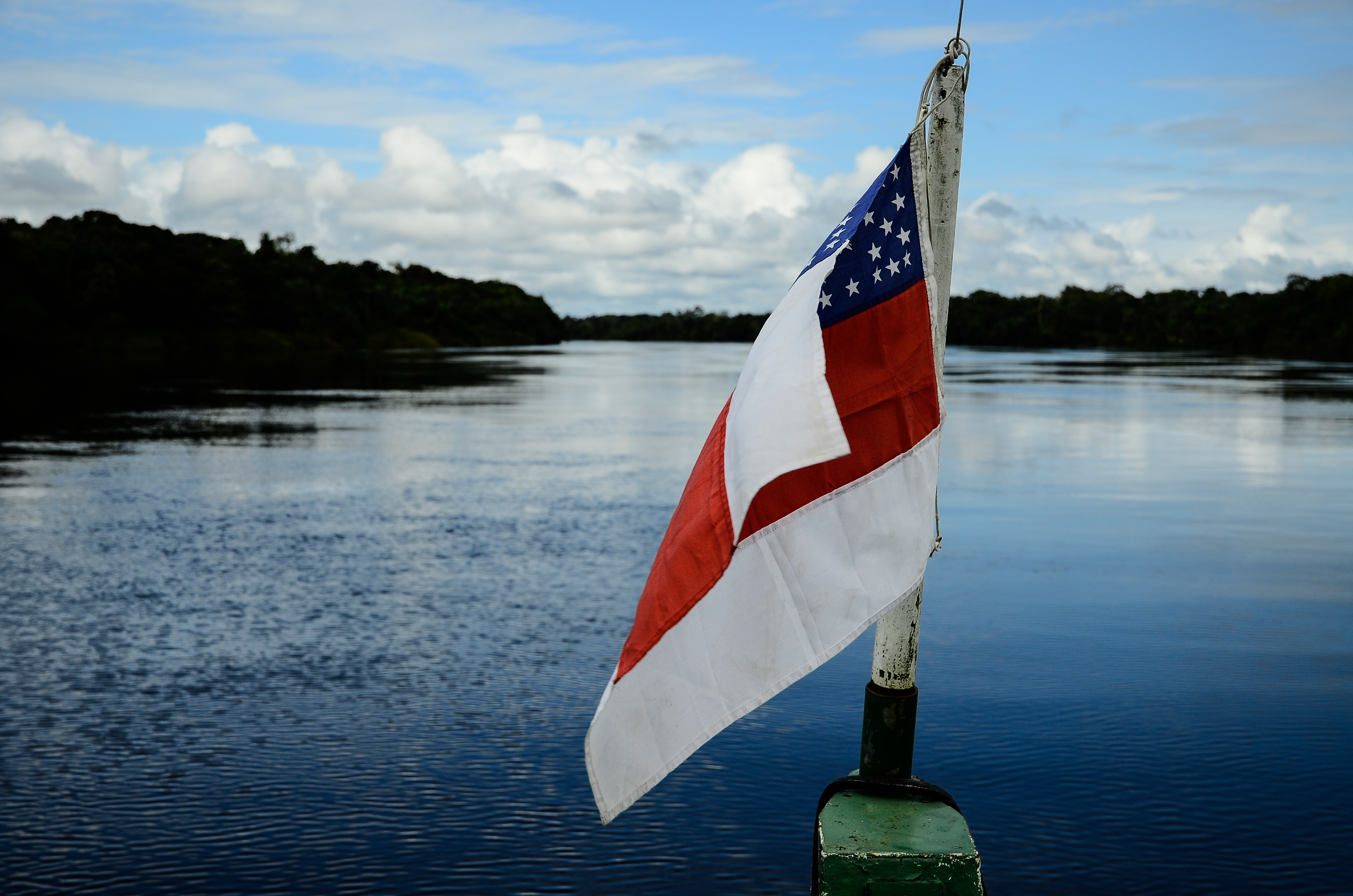 Amazonas State Flag on boat into Rio Unini.