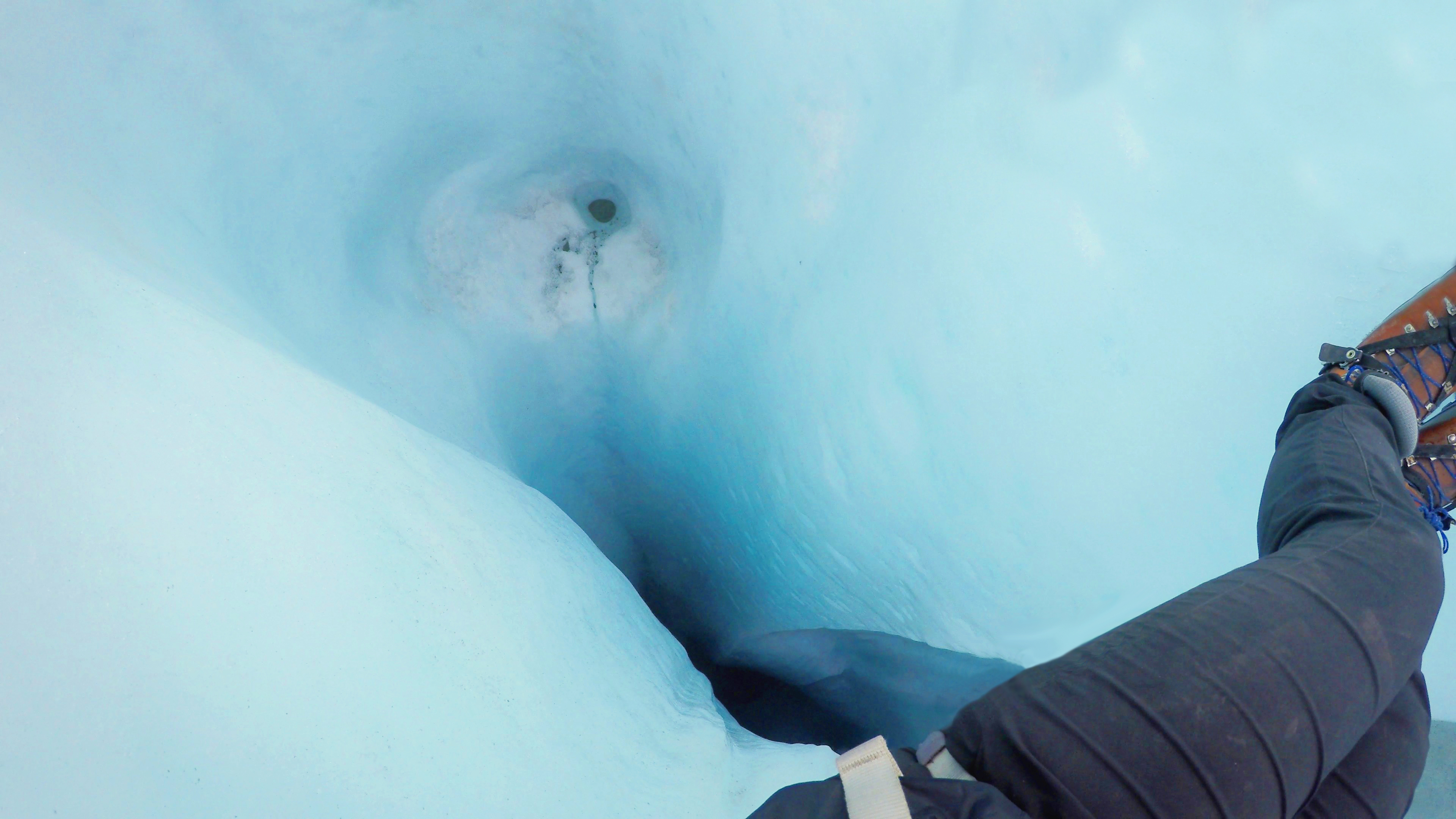 My view from inside the moulin; it was so deep that I was not able to see the bottom, which would have revealed an underground river that passed through the glacier.